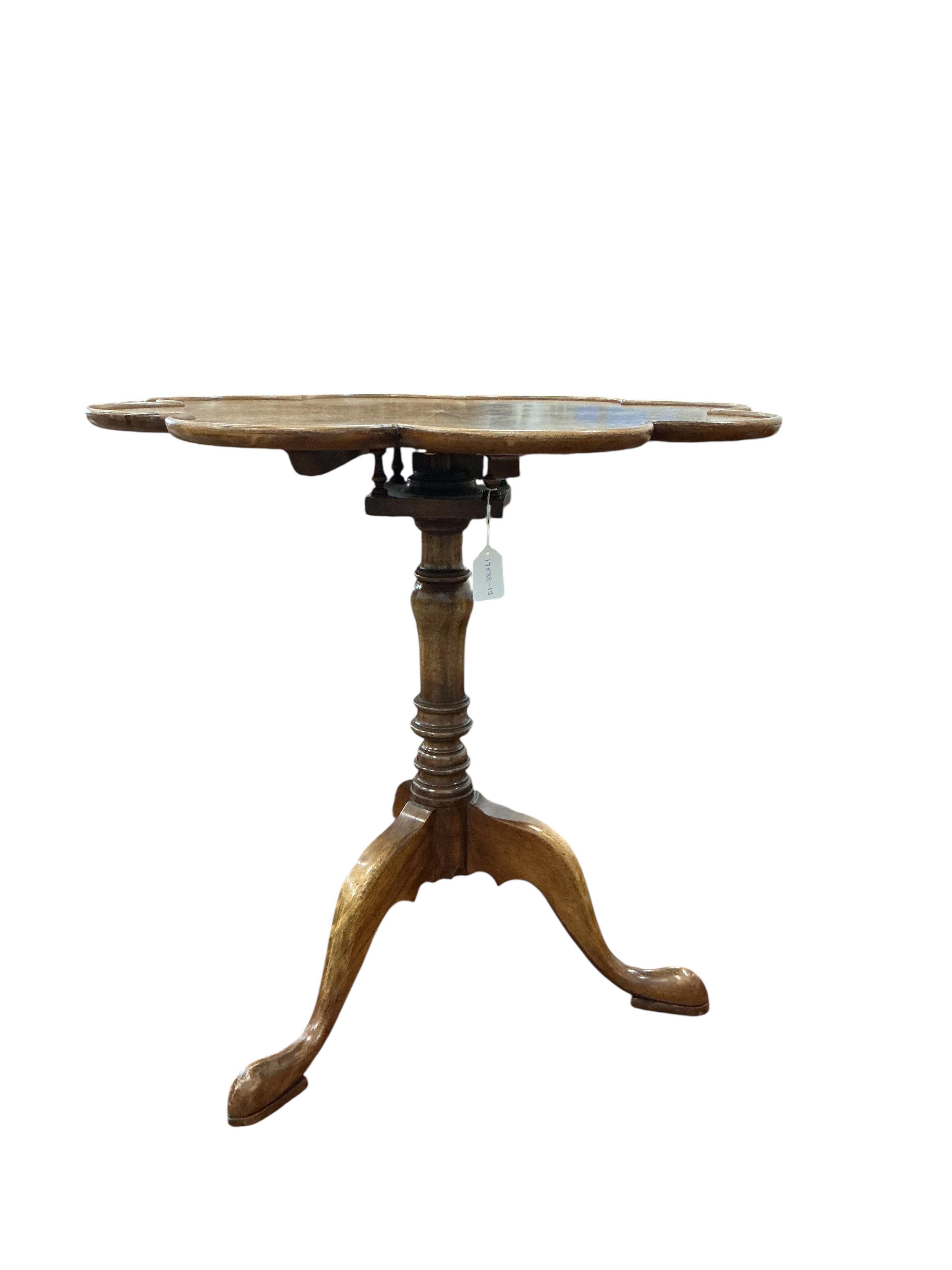 A reproduction mahogany tilt top tripod tea table, diameter 67cm, height 66cm